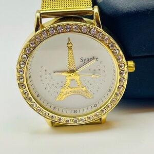 Gold Tone Watch with Eiffel Tower and Rhinestone Bezel with a Chain Mesh Band